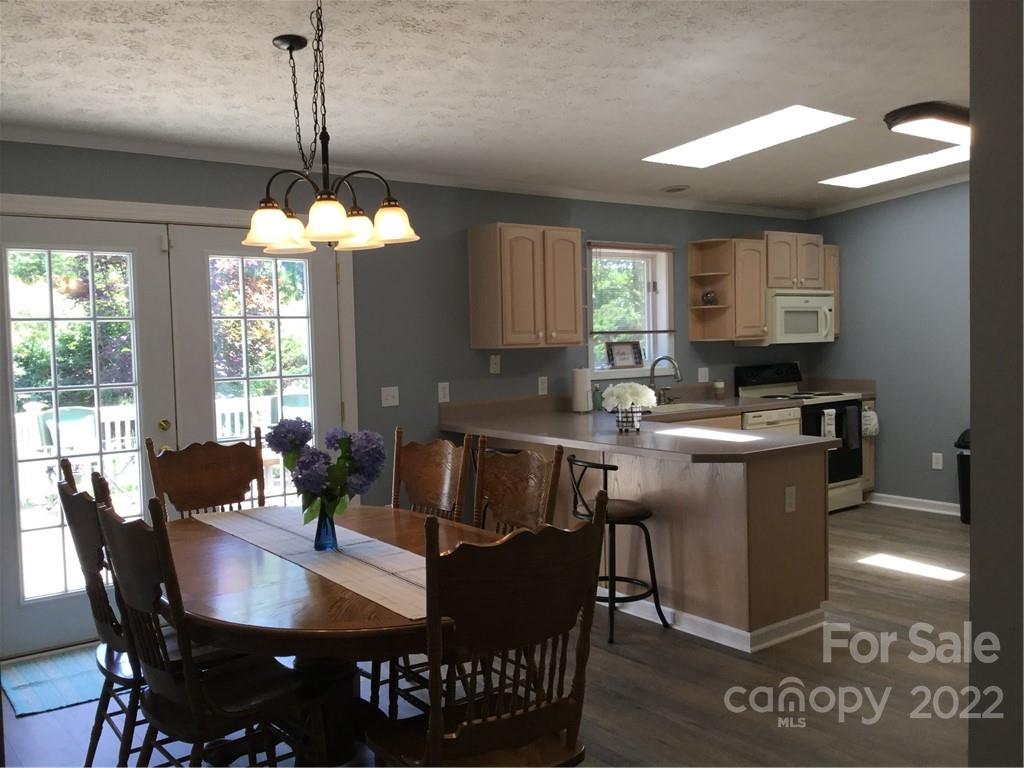 134 V S Dalton Road Rutherfordton, NC 28139 - Photo 21 of 43 a view of a dining room with furniture window and outside view