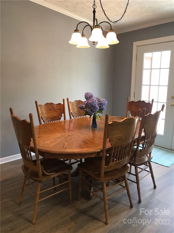 134 V S Dalton Road Rutherfordton, NC 28139 - Photo 23 of 43 a view of a dining room with furniture and chandelier