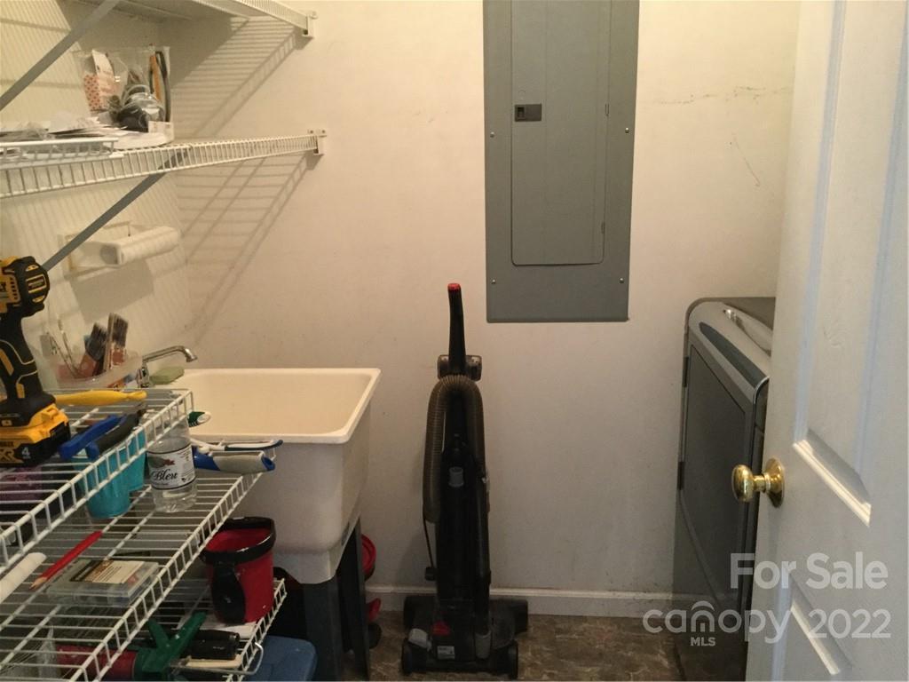 134 V S Dalton Road Rutherfordton, NC 28139 - Photo 26 of 43 a bathroom with a sink and a mirror