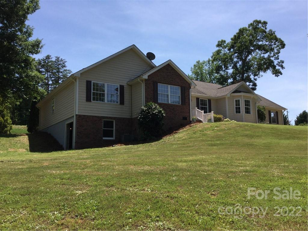 134 V S Dalton Road Rutherfordton, NC 28139 - Photo 4 of 43 a front view of a house with a yard