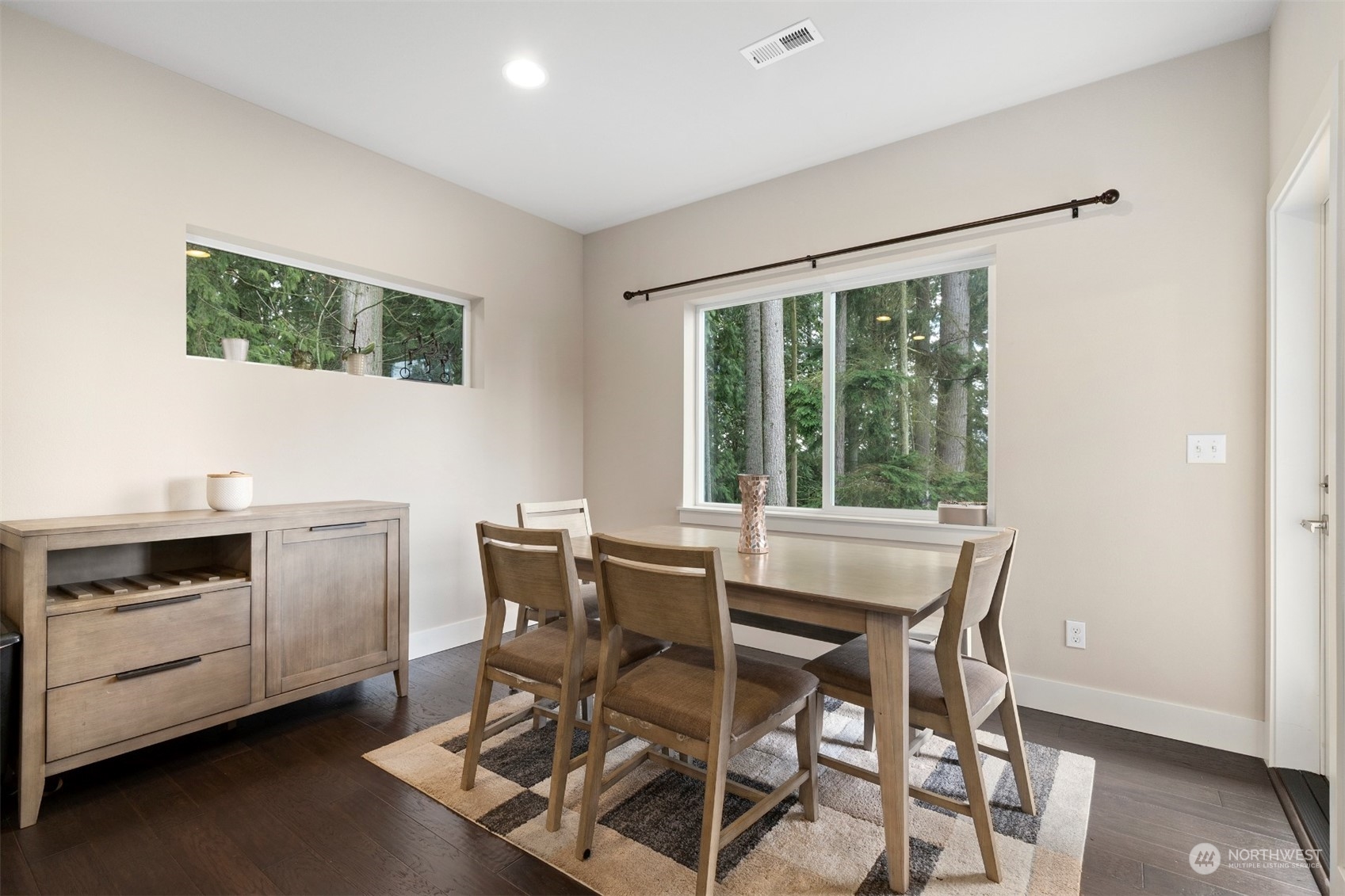 4206 223rd Place Southeast Bothell, WA 98021 - Photo 11 of 40 a view of a dining room with furniture and a window