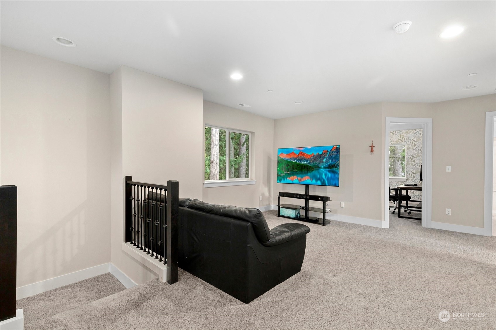 4206 223rd Place Southeast Bothell, WA 98021 - Photo 15 of 40 a living room with furniture and a flat screen tv
