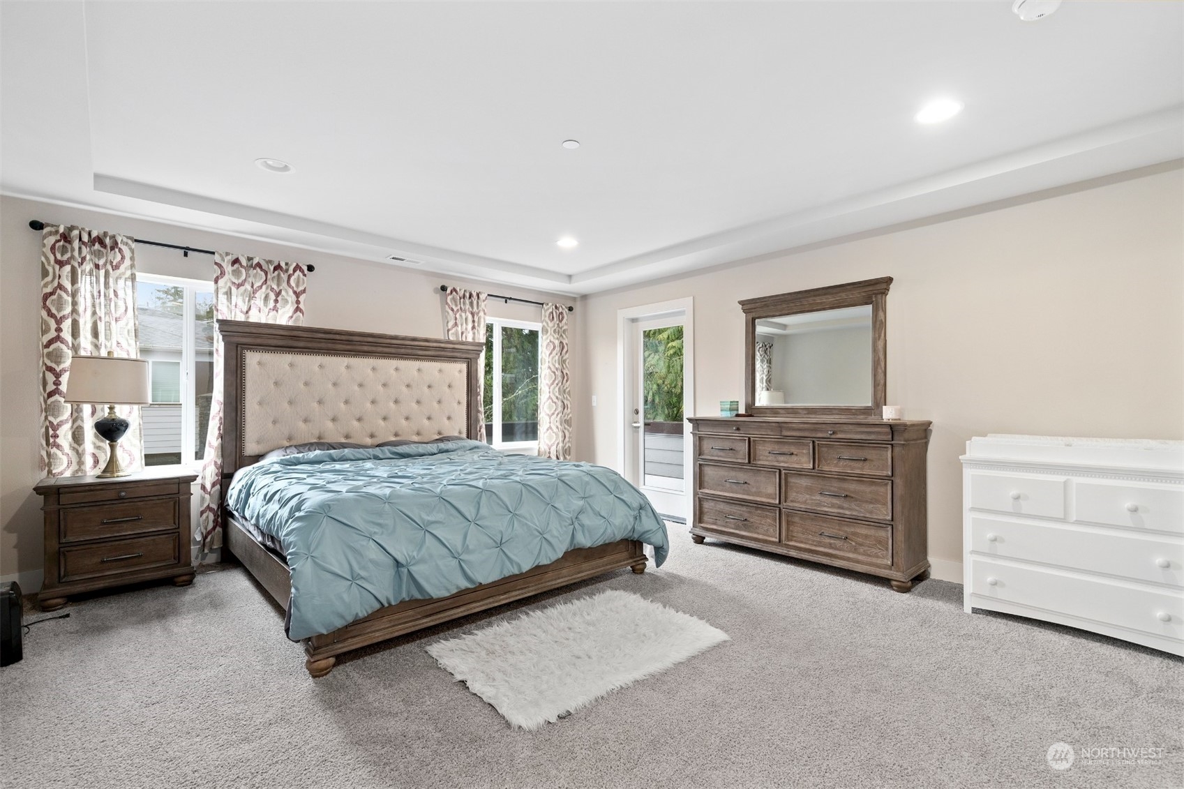 4206 223rd Place Southeast Bothell, WA 98021 - Photo 17 of 40 a bedroom with a double bed and dresser