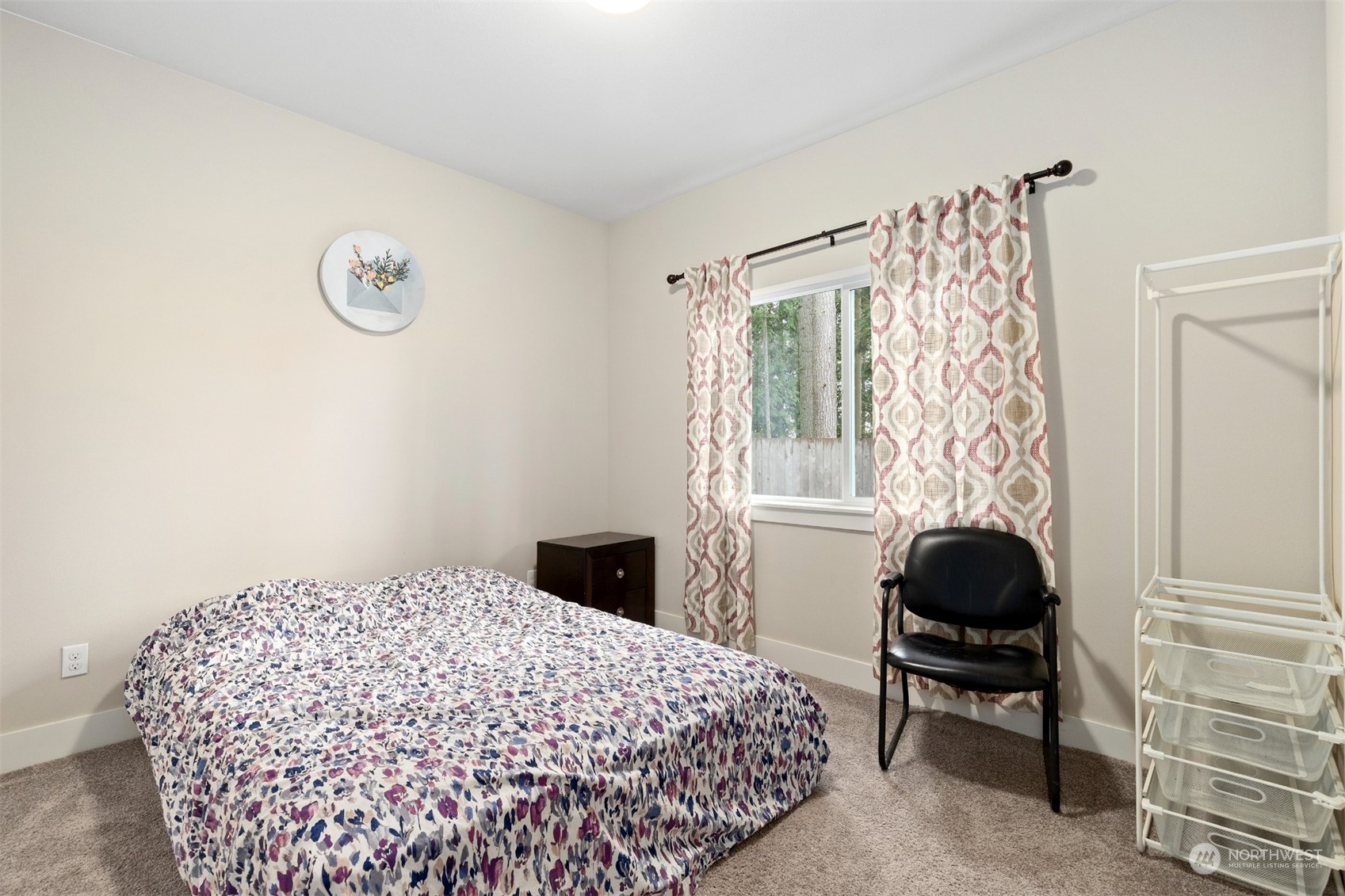 4206 223rd Place Southeast Bothell, WA 98021 - Photo 31 of 40 a bedroom with a bed and a chair