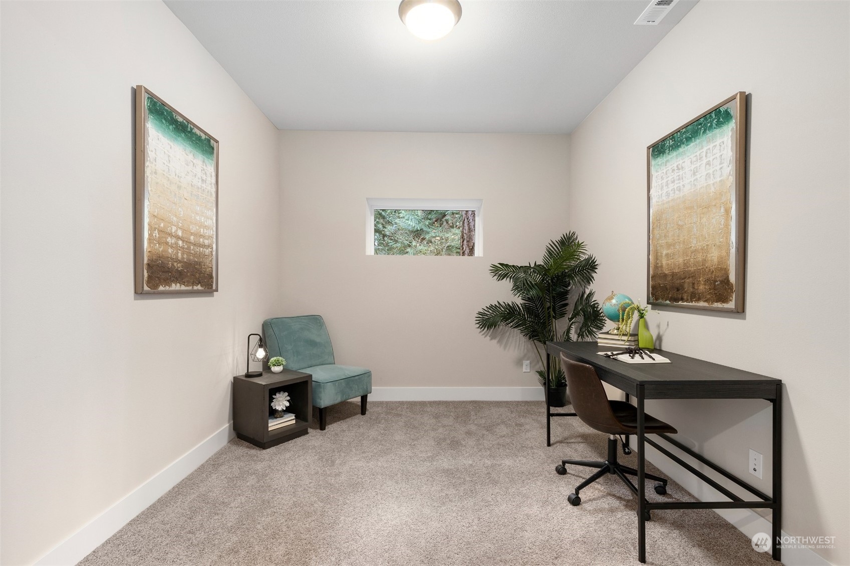 4206 223rd Place Southeast Bothell, WA 98021 - Photo 32 of 40 a living room with furniture and a potted plant