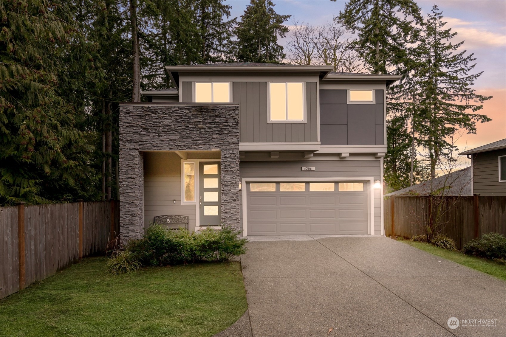 4206 223rd Place Southeast Bothell, WA 98021 - Photo 36 of 40 a front view of a house with garden