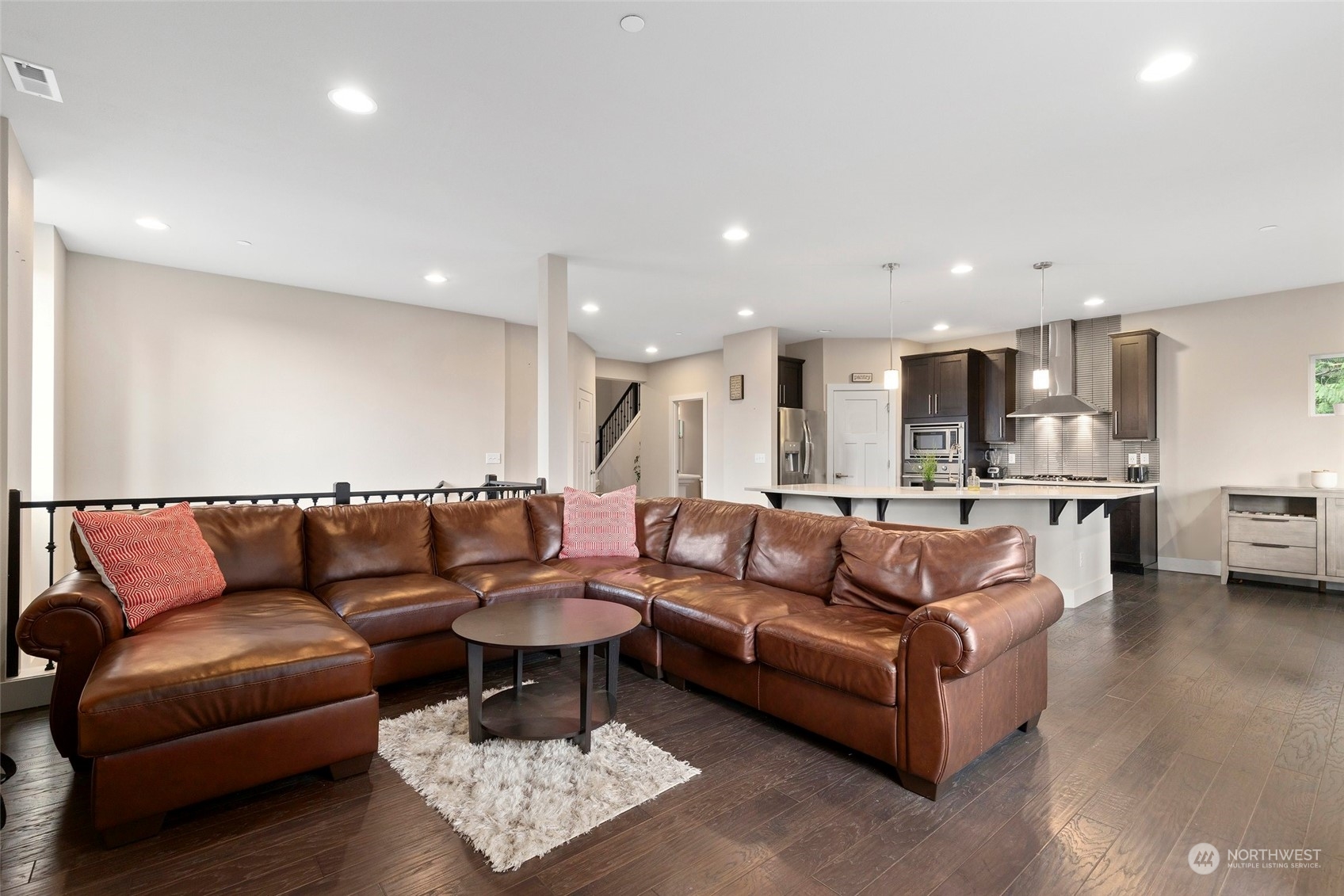 4206 223rd Place Southeast Bothell, WA 98021 - Photo 7 of 40 a living room with furniture and kitchen view