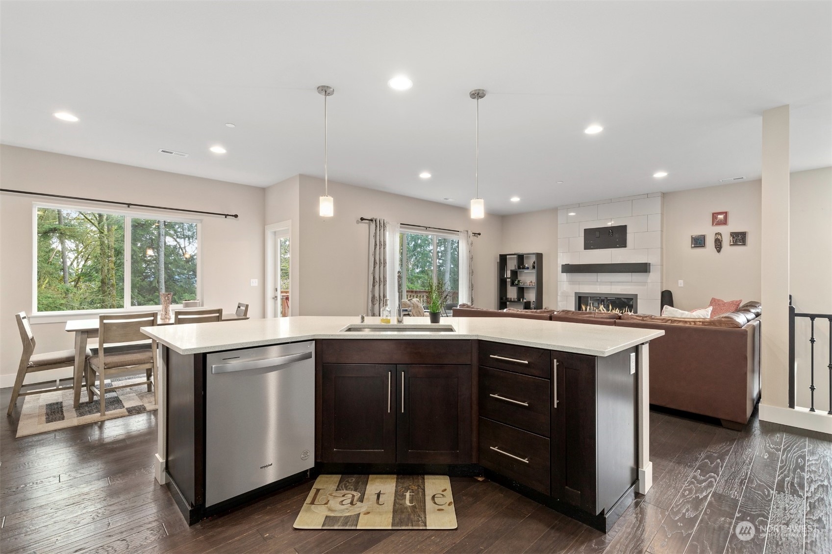 4206 223rd Place Southeast Bothell, WA 98021 - Photo 10 of 40 a kitchen with lots of counter top space sink and center island