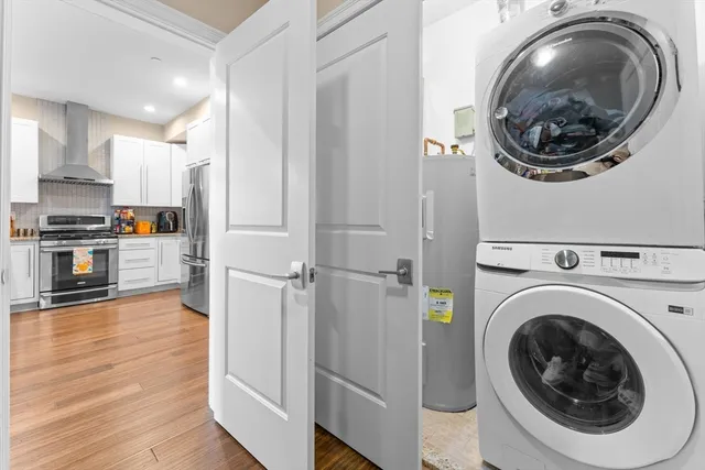 a view of a kitchen with washer and dryer