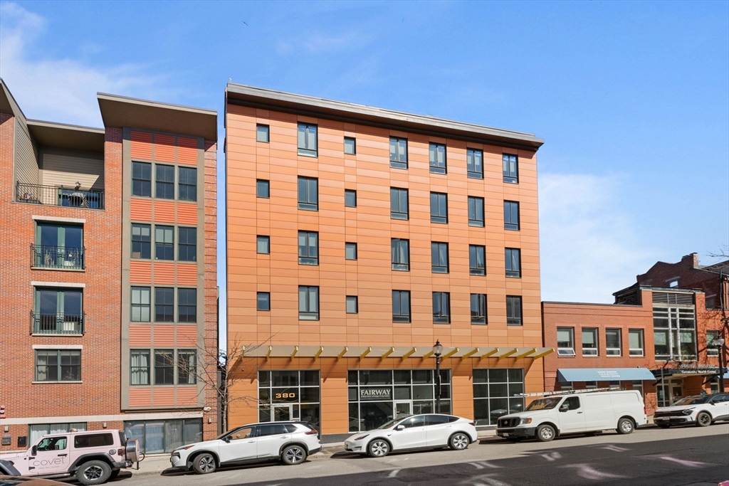 380 West Broadway, Unit 401 Boston, MA 02127 - Photo 21 of 25 a front view of a building with street view