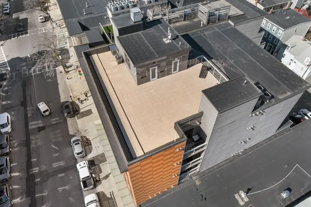 an aerial view of a house with balcony