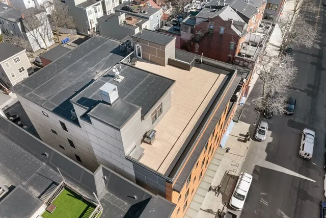 an aerial view of a house with balcony