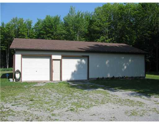 43 South Summit Road Greenville, PA 16125 - Photo 3 of 17 Shop/Service Bay(s). 32 x 48 detached building. w/ 8x9 doors cemented and electric. Work from home or great for hobbyist.
