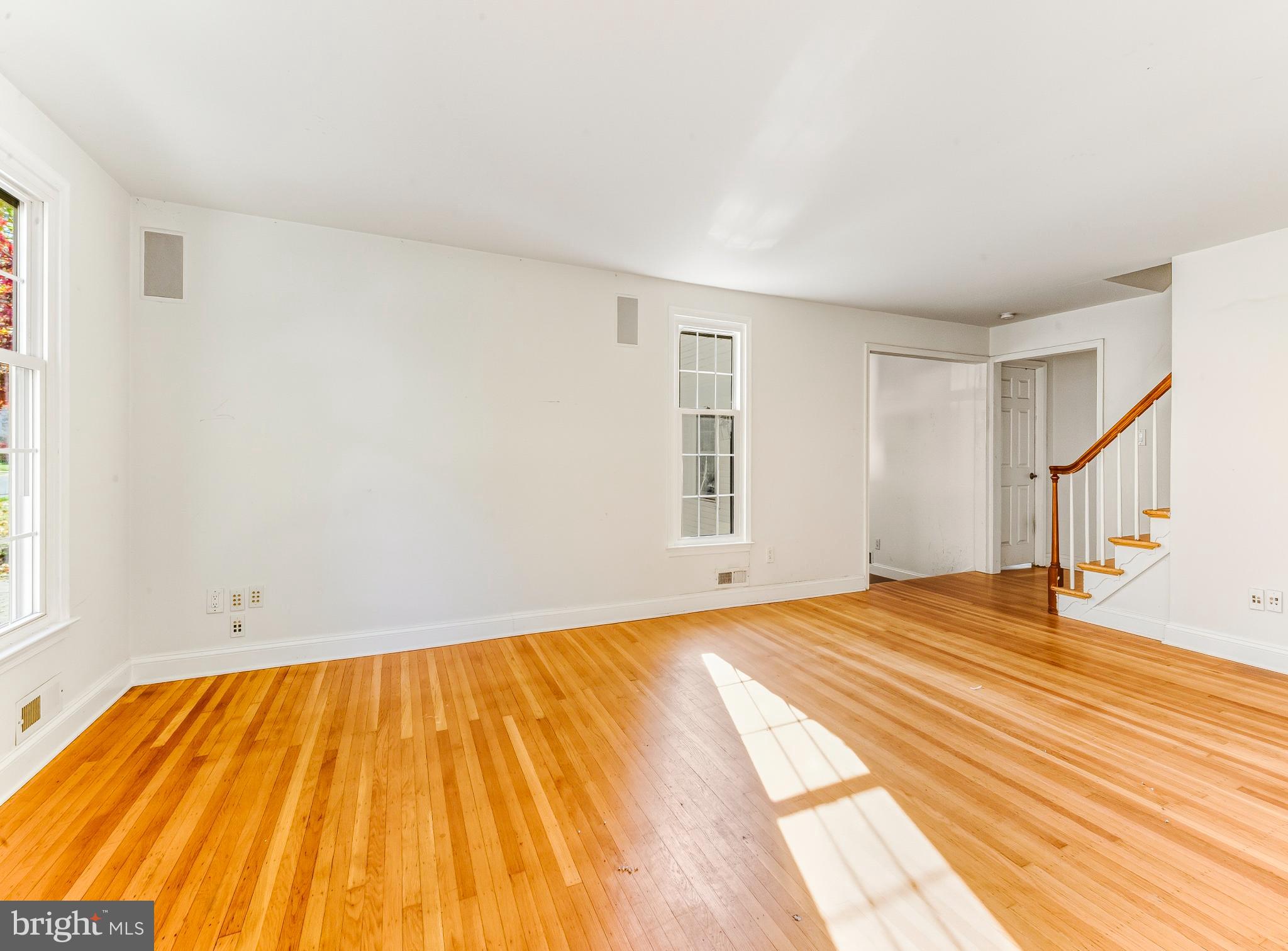1102 Barnesdale Road West Deptford, NJ 08096 - Photo 11 of 32 a view of a bedroom with a bed and wooden floor