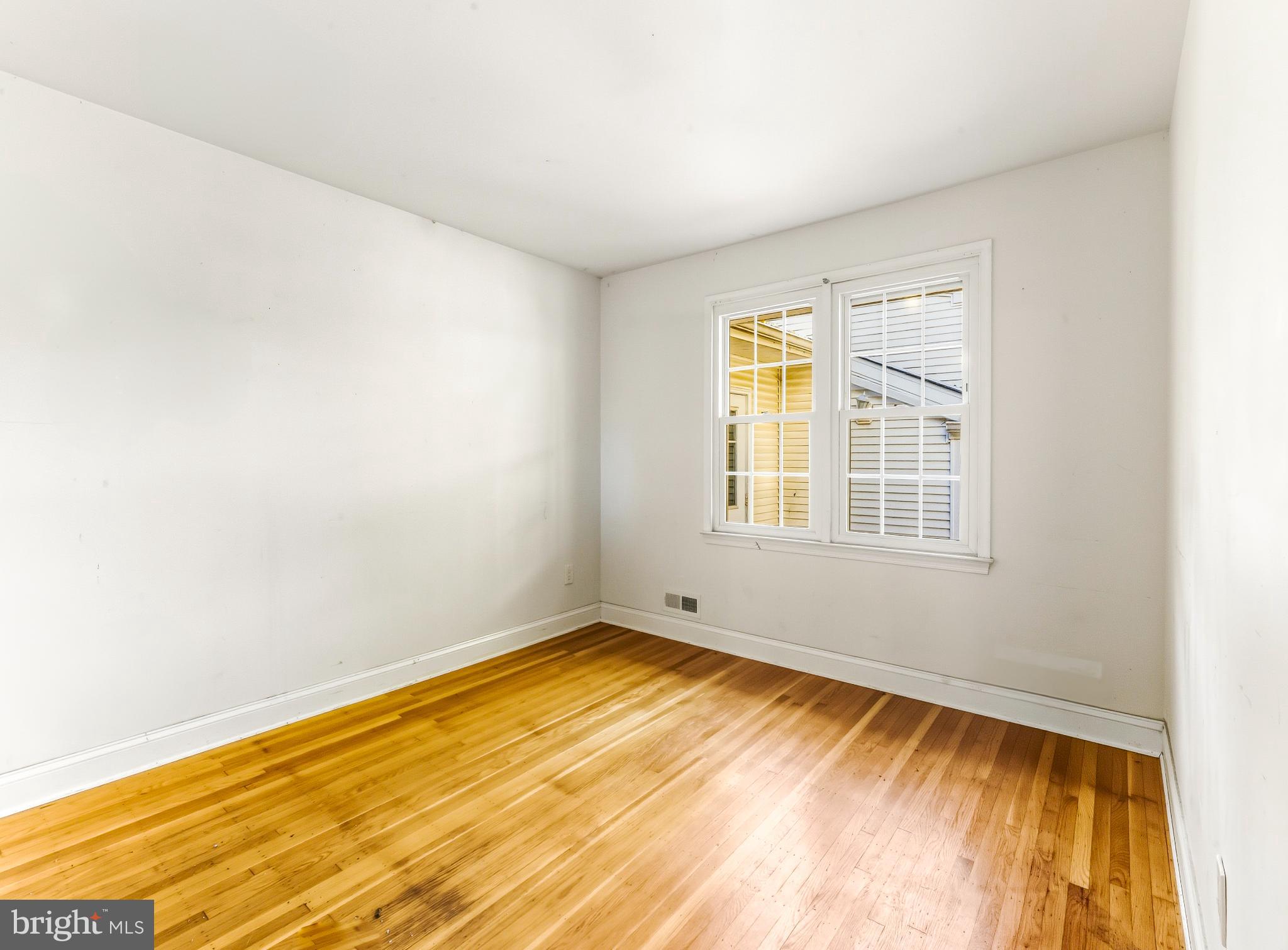 1102 Barnesdale Road West Deptford, NJ 08096 - Photo 14 of 32 a view of an empty room with a window