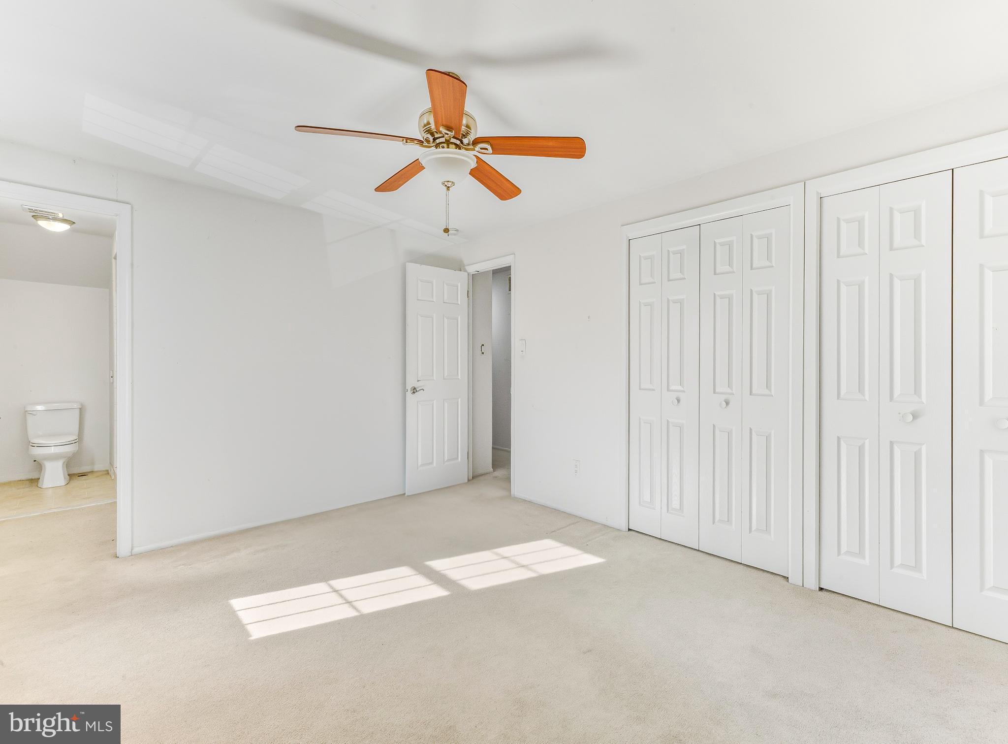 1102 Barnesdale Road West Deptford, NJ 08096 - Photo 15 of 32 a view of an empty room with a ceiling fan
