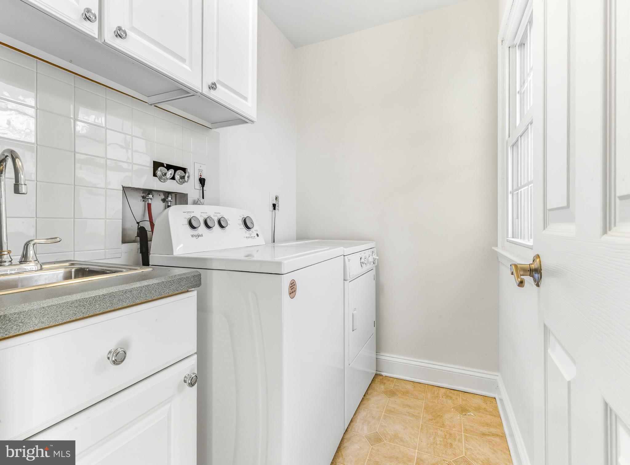 1102 Barnesdale Road West Deptford, NJ 08096 - Photo 22 of 32 a utility room with dryer and washer
