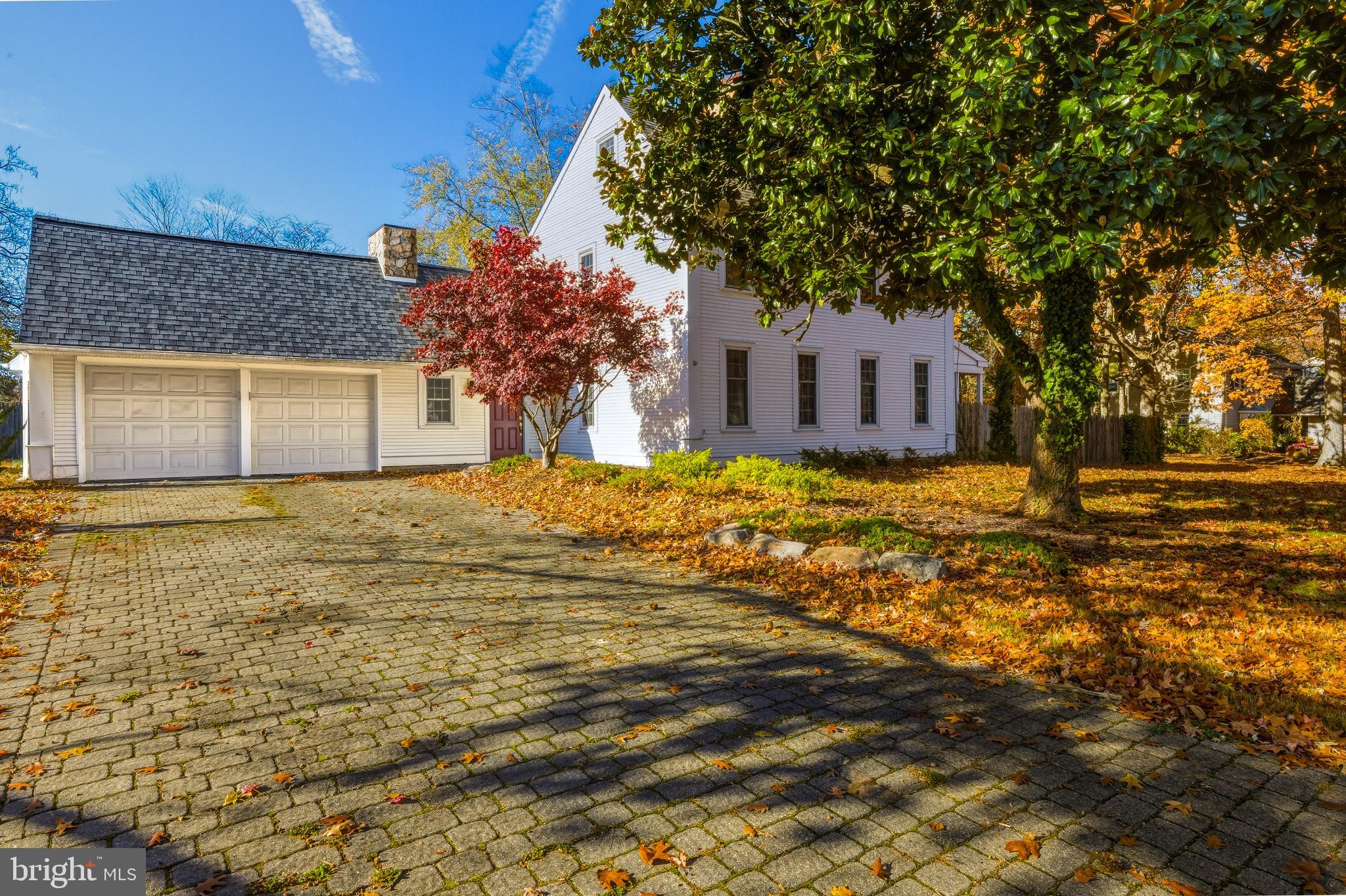 1102 Barnesdale Road West Deptford, NJ 08096 - Photo 3 of 32 a house that has a tree in front of it