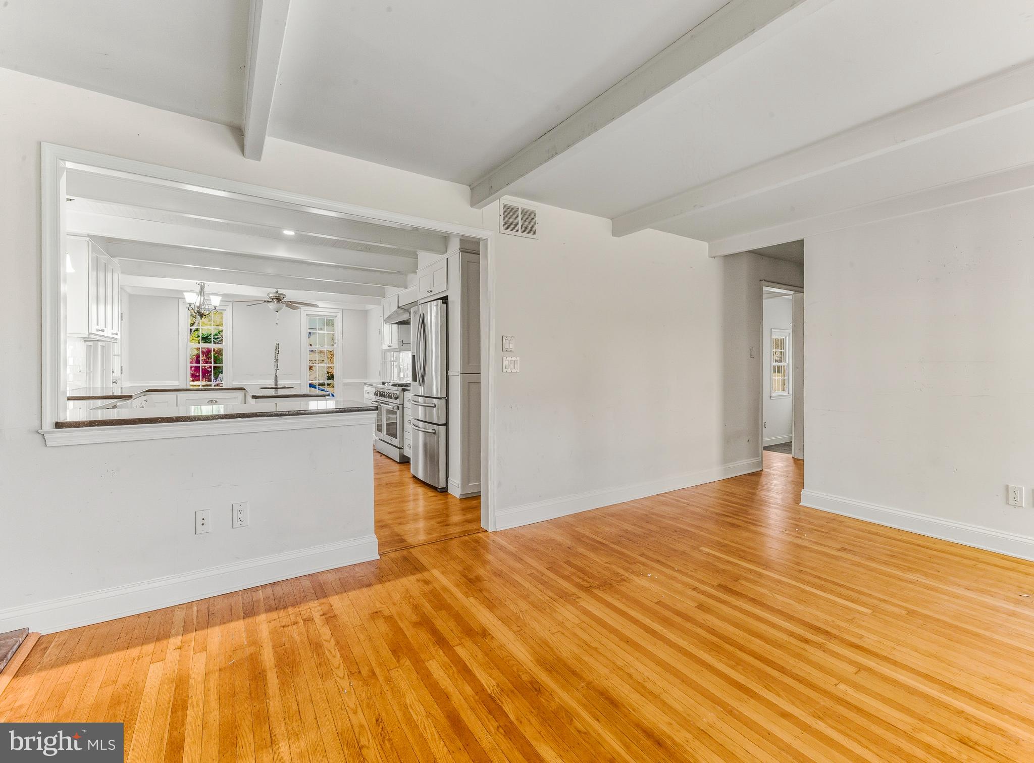 1102 Barnesdale Road West Deptford, NJ 08096 - Photo 8 of 32 a view of a kitchen with wooden floor and a sink