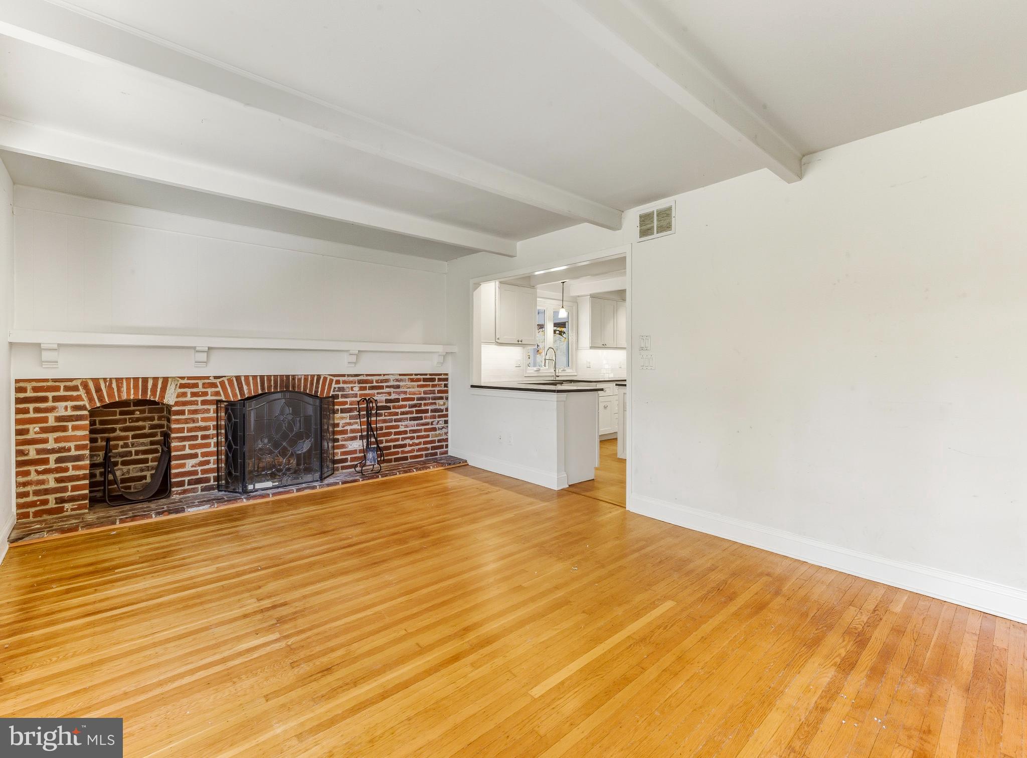 1102 Barnesdale Road West Deptford, NJ 08096 - Photo 9 of 32 a view of a kitchen with wooden floor