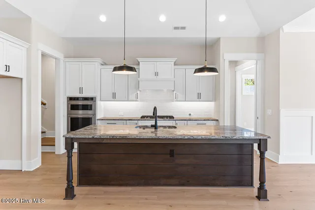 $803,865 | 1943 Redfish Street Southwest, Supply, NC 28462