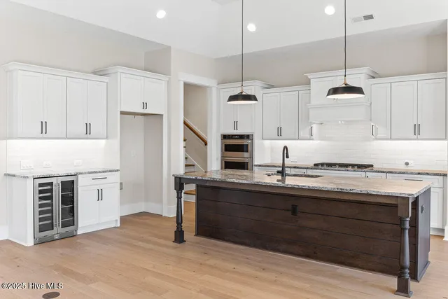 $803,865 | 1943 Redfish Street Southwest, Supply, NC 28462