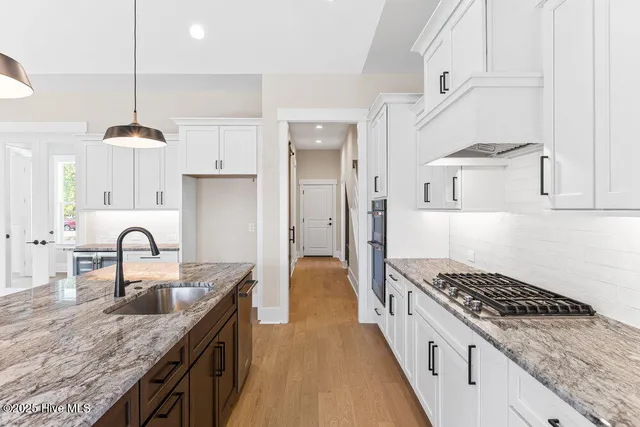 $803,865 | 1943 Redfish Street Southwest, Supply, NC 28462