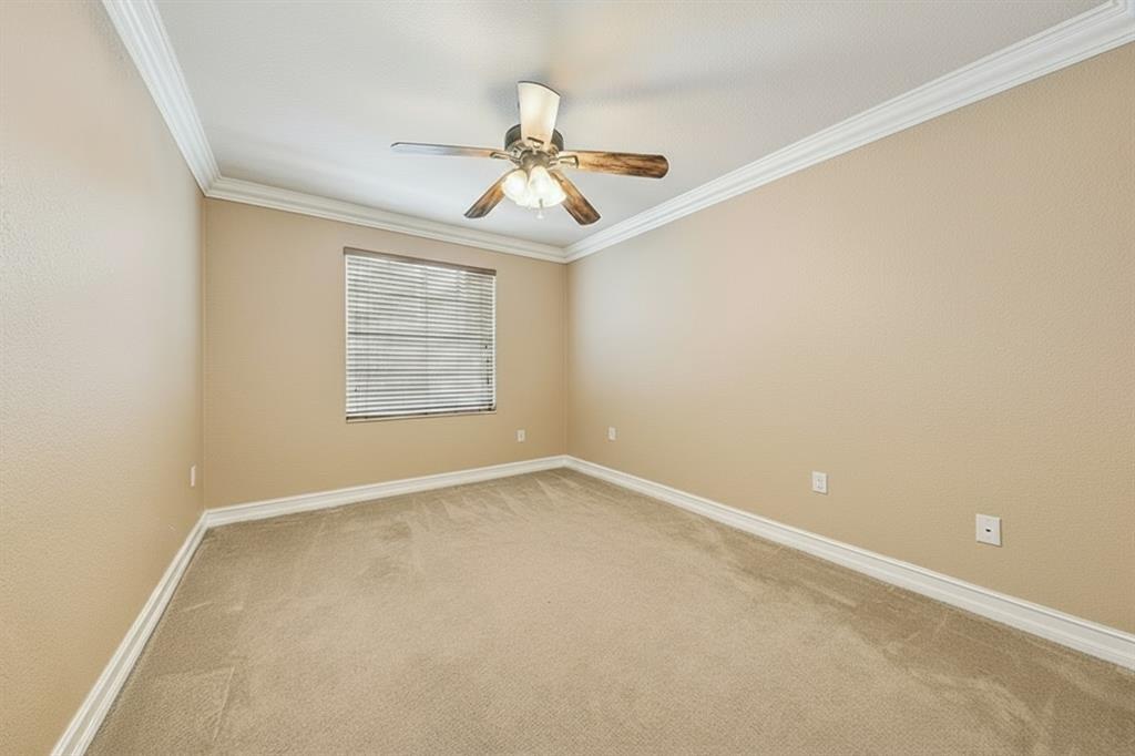 2755 Southwest 165th Avenue Miramar, FL 33027 - Photo 14 of 18 an empty room with windows and fan