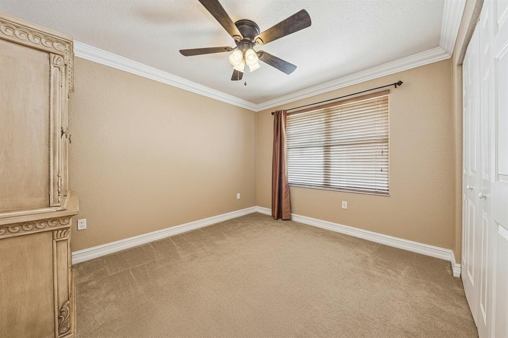 2755 Southwest 165th Avenue Miramar, FL 33027 - Photo 15 of 18 an empty room with windows and fan
