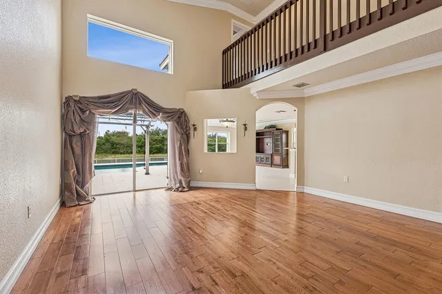 a view of a house with porch and wooden floor
