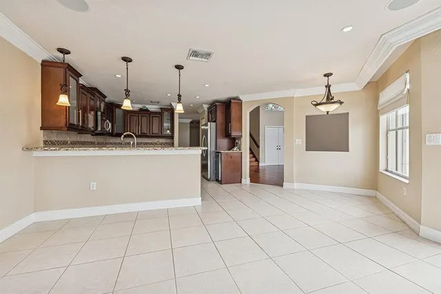 a view of a kitchen with a sink