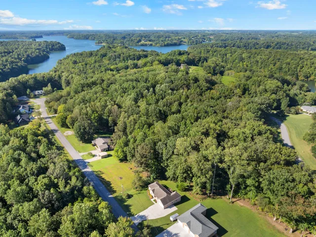 an aerial view of residential house with outdoor space