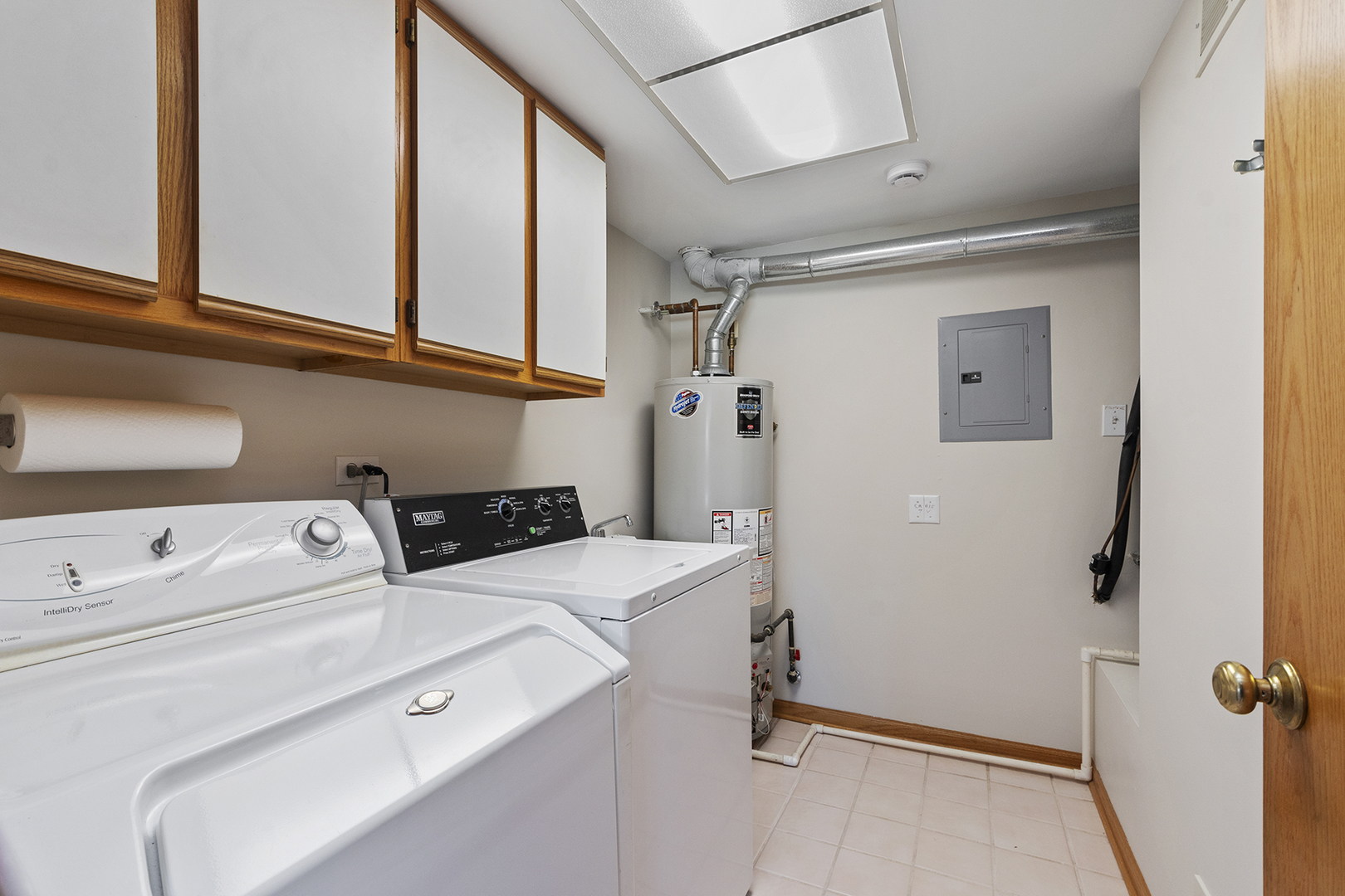 18136 Rita Road, Unit 1C Tinley Park, IL 60477 - Photo 15 of 26 a utility room with dryer and washer