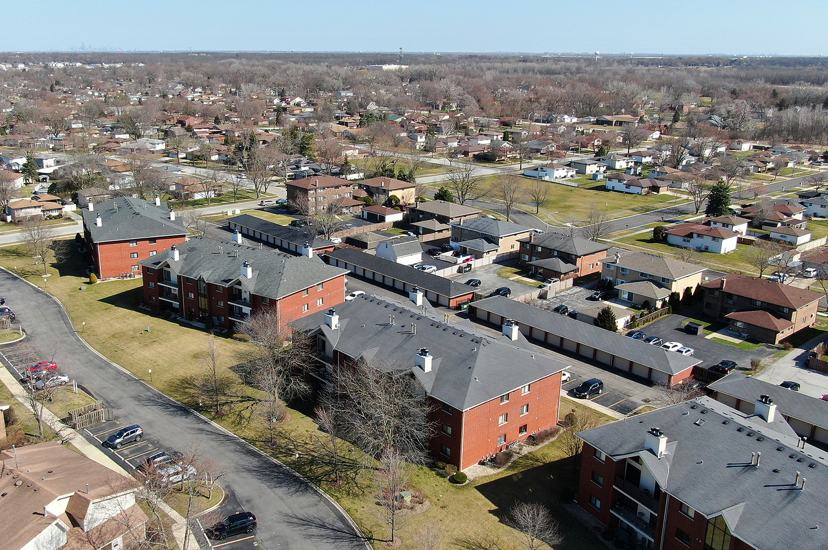 18136 Rita Road, Unit 1C Tinley Park, IL 60477 - Photo 26 of 26 an aerial view of a city with lots of residential buildings
