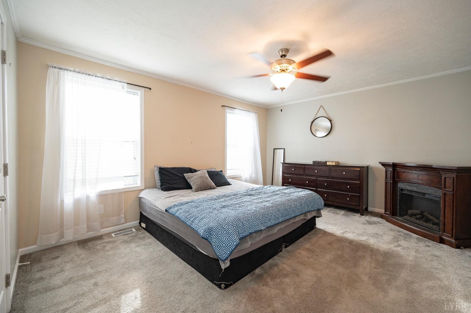 563 Evington Road Evington, VA 24550 - Photo 16 of 17 a living room with a bed furniture and a window