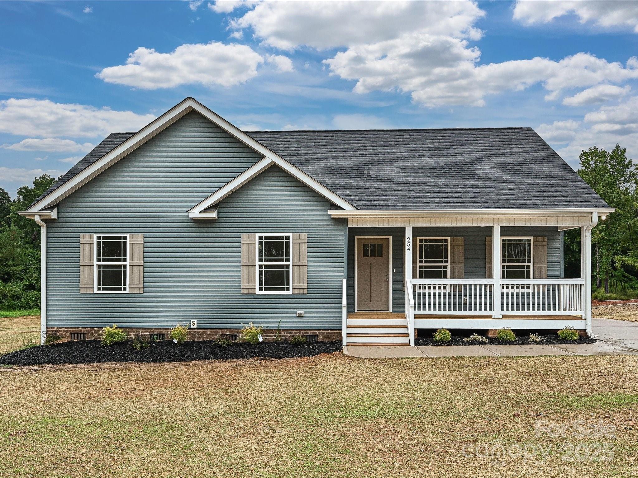 front view of a house with yard