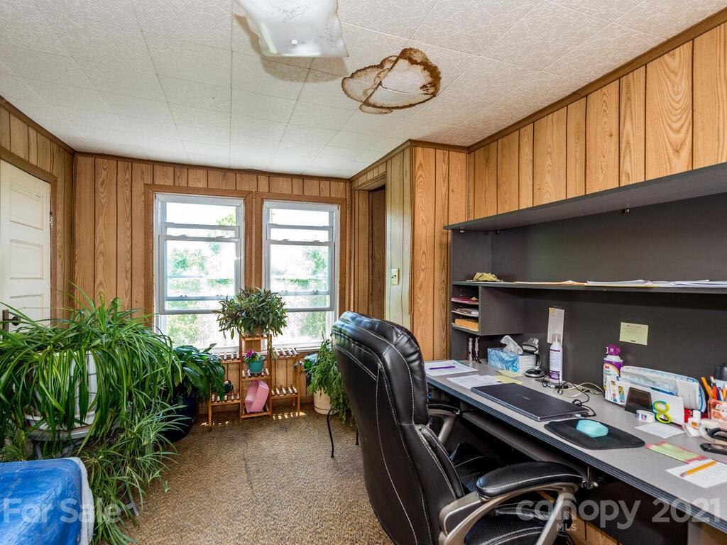 131 Frisby Road Marshall, NC 28753 - Photo 25 of 32 a livingroom with furniture and a potted plant