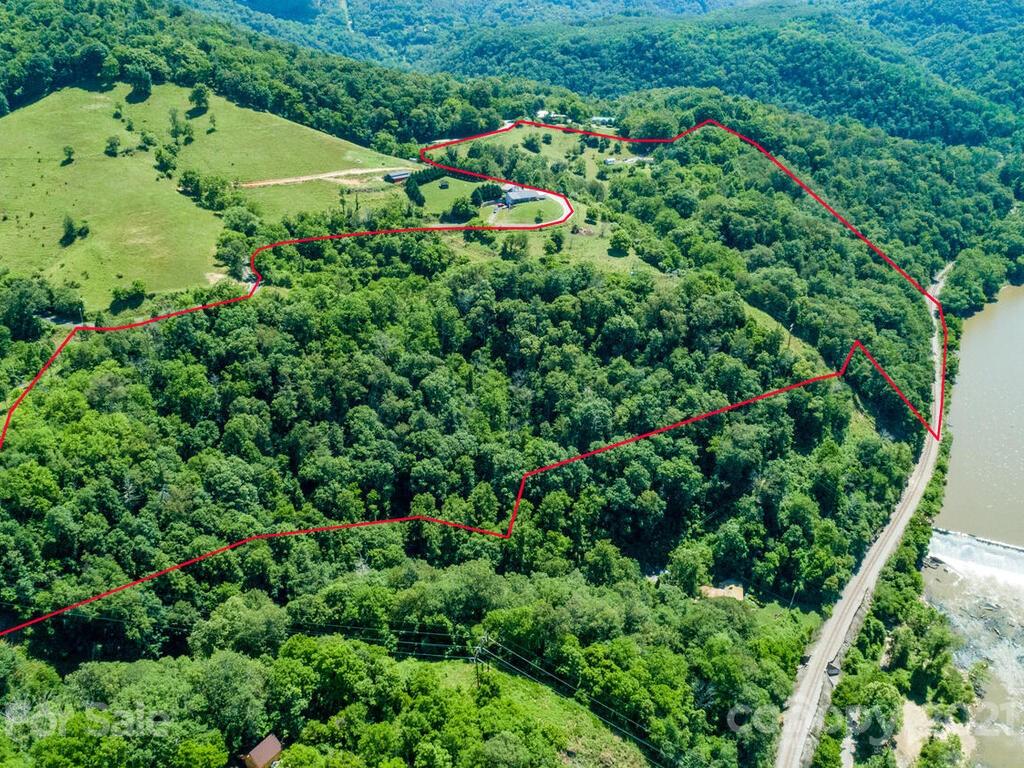 131 Frisby Road Marshall, NC 28753 - Photo 29 of 32 an aerial view of a house with a yard