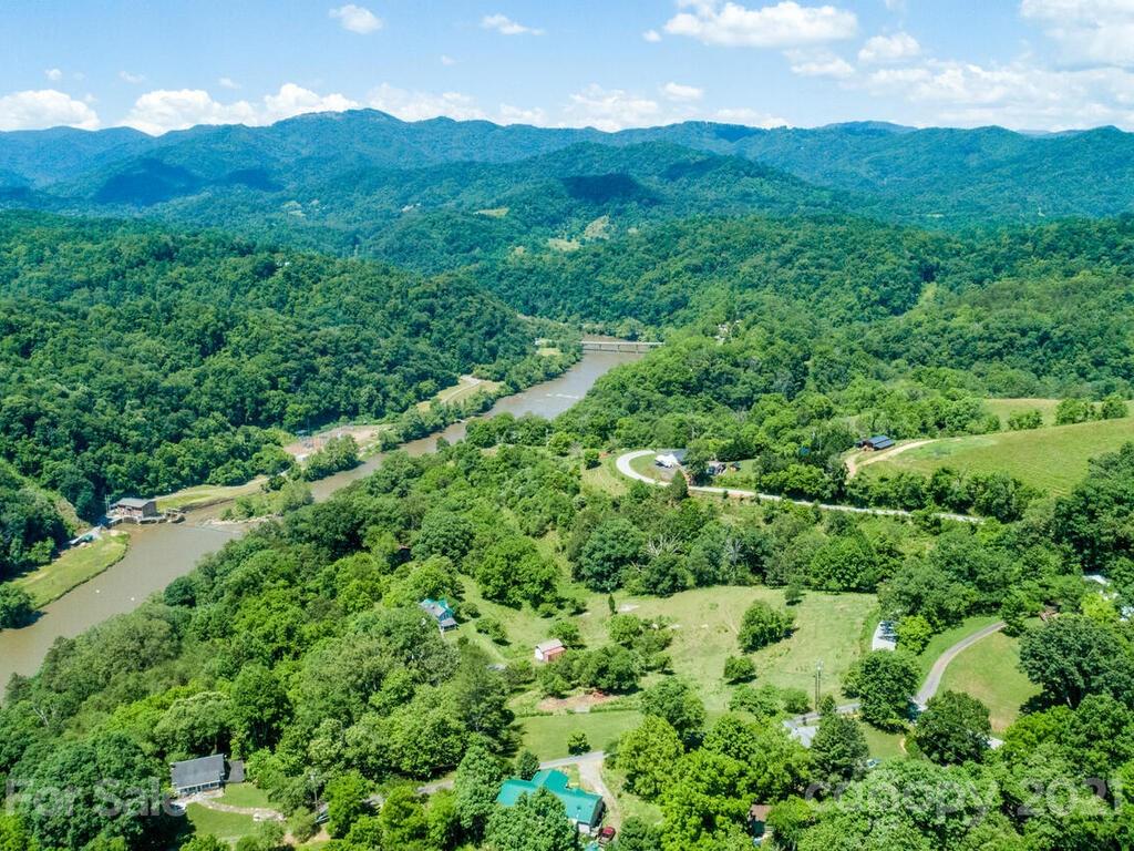 131 Frisby Road Marshall, NC 28753 - Photo 31 of 32 a view of a lush green hillside and houses