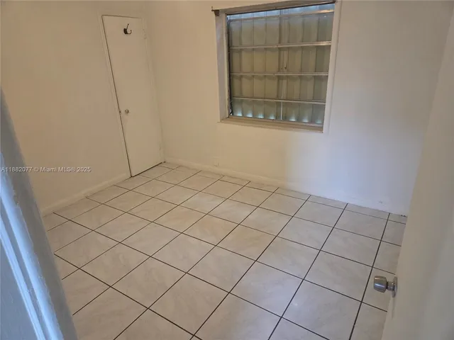 a view of a room and window