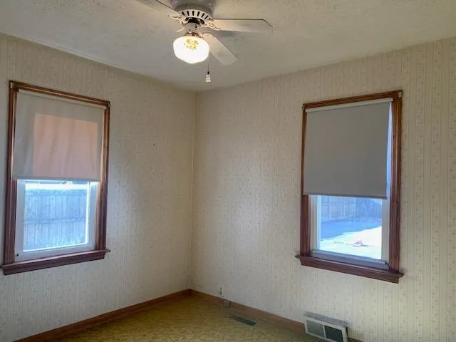 a bathroom with a toilet and a sink