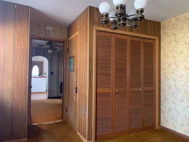 a view of a kitchen with a sink and cabinets