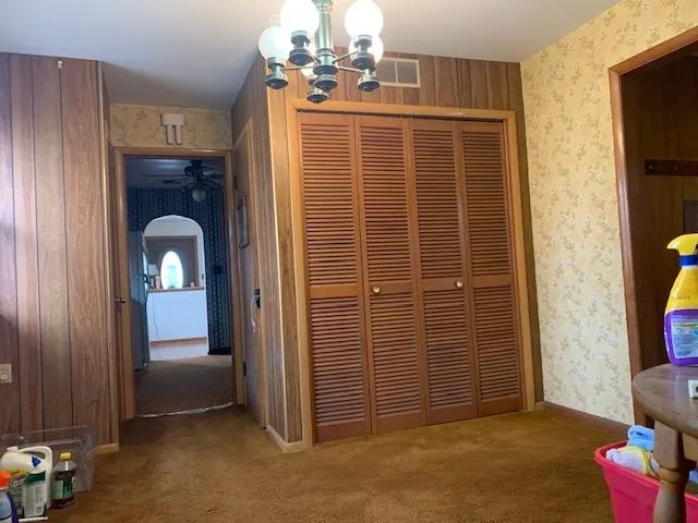 a white toilet sitting next to a bathroom sink