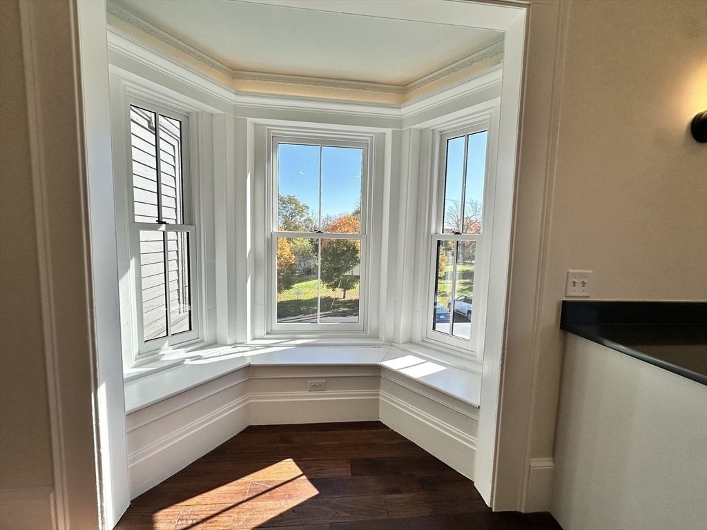 11 Lowell Road, Unit 2B Groton, MA 01450 - Photo 8 of 19 a room with window and cabinet