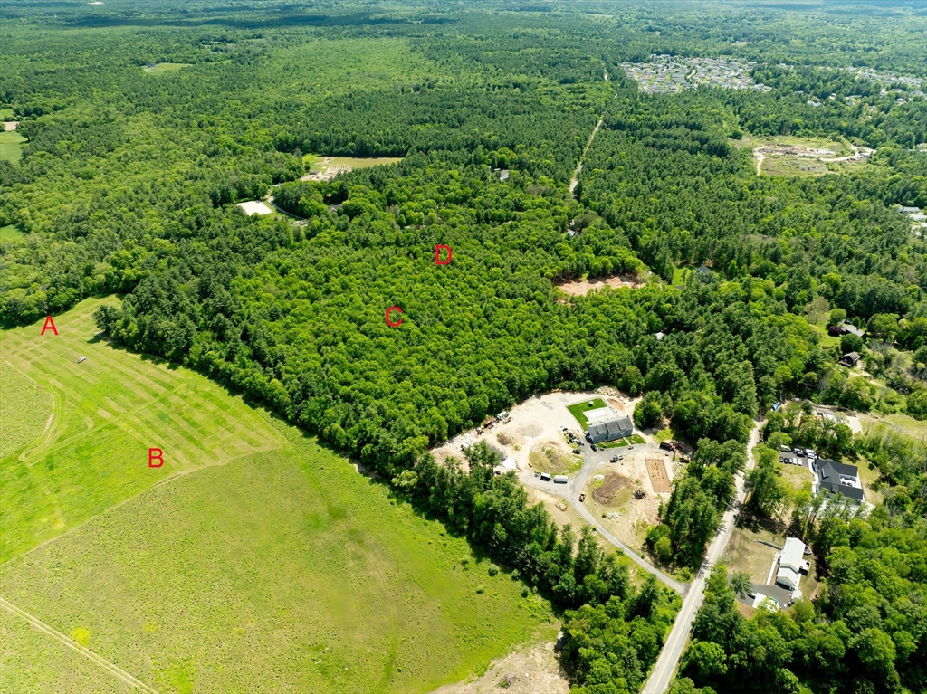 Lot D Plain Street Middleboro, MA 02346 - Photo 4 of 13 a view of a large yard with lots of green space