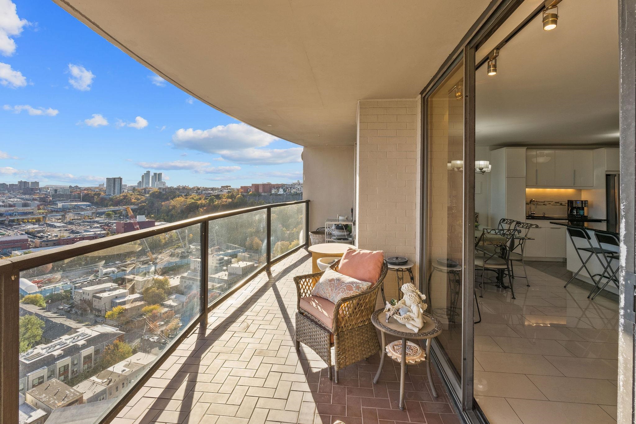 380 Mountain Road, Unit 612 Union City, NJ 07087 - Photo 7 of 45 a view of a balcony with chairs