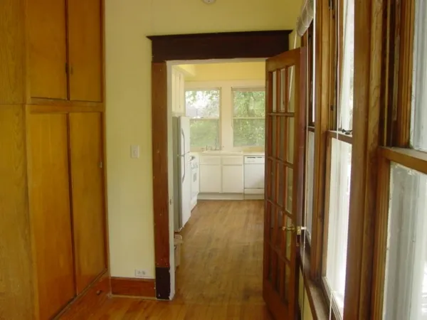 a view of a bathroom with a glass door