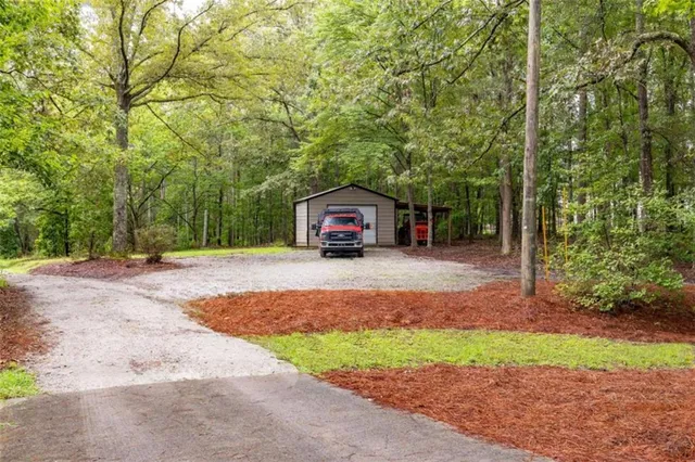 a house view with a backyard space