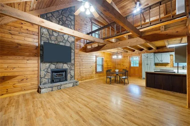 a view of a hall with wooden floor