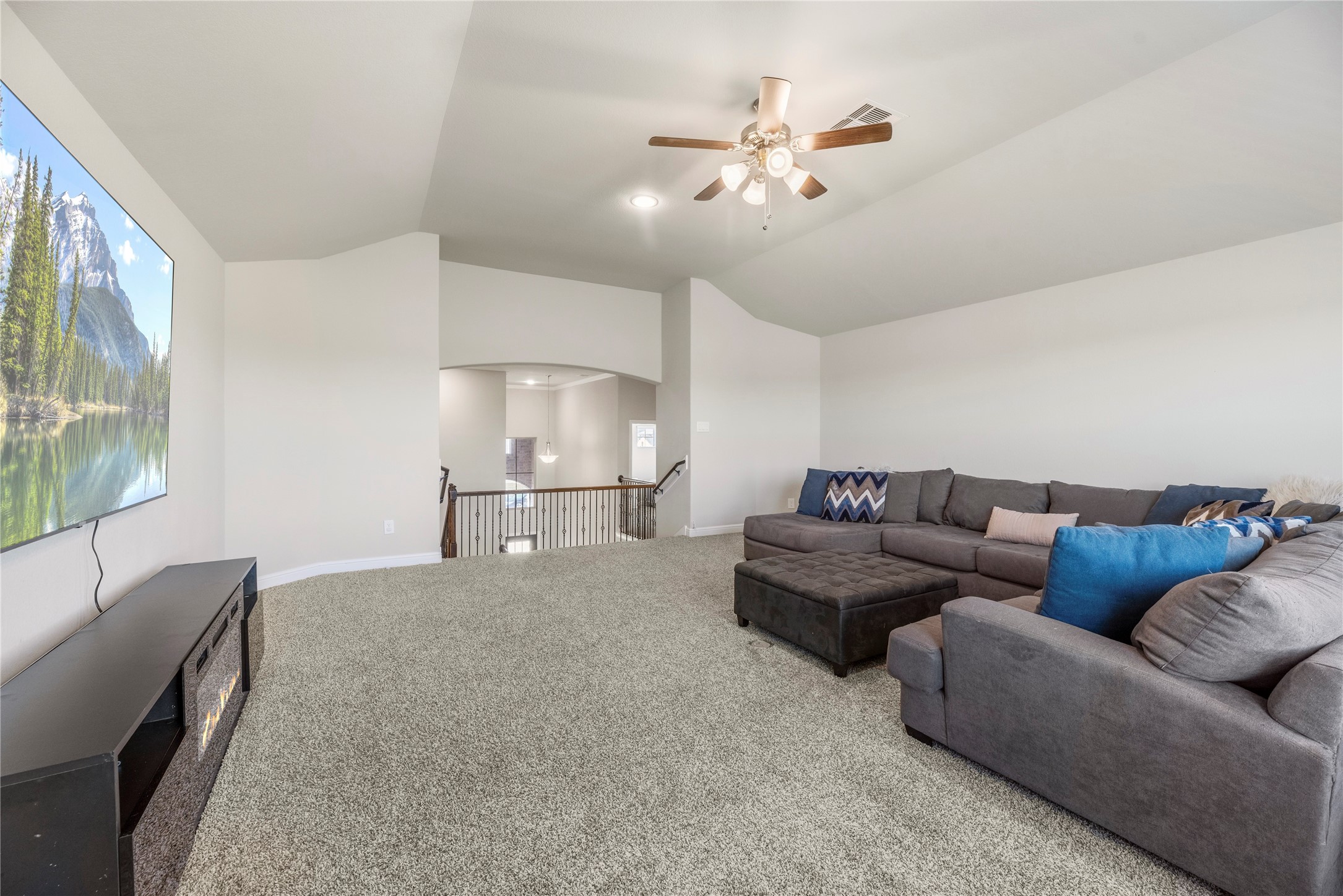 3319 Learning Tree Lane Rosenberg, TX 77471 - Photo 20 of 44 a living room with furniture and a chandelier